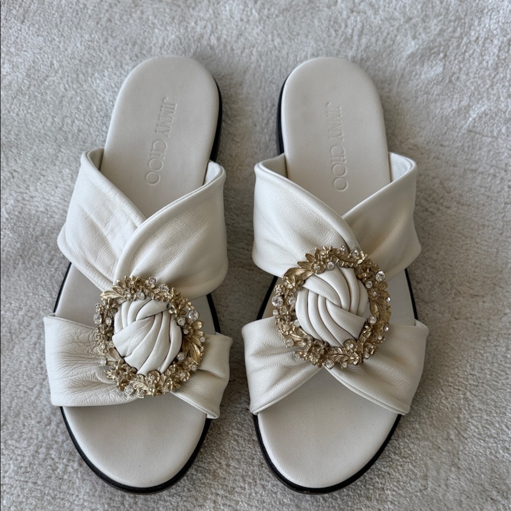 Jimmy Choo White Leather Knotted Slide Sandals with Gold Crystal Medallion